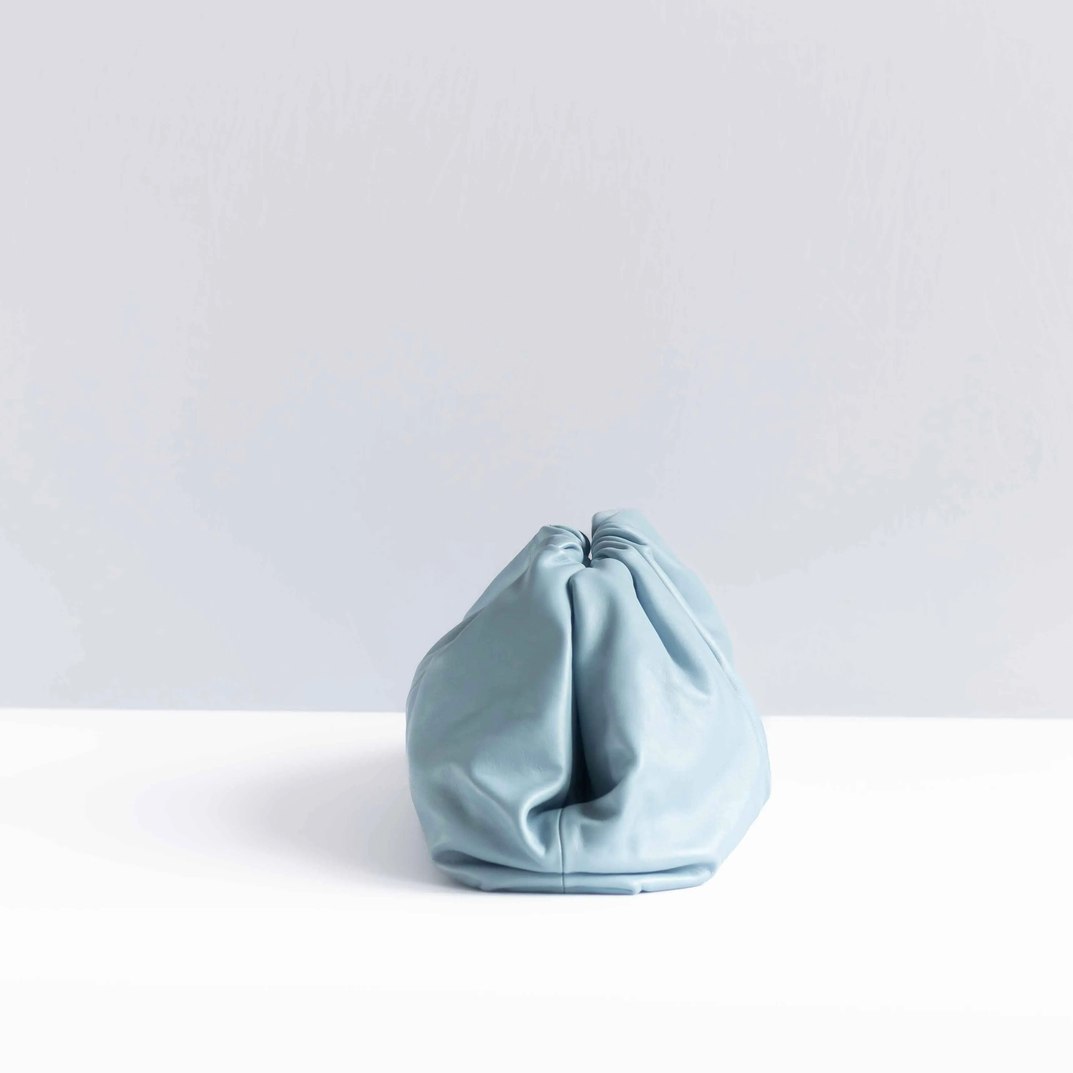 BOTTEGA VENETA - POUCH BAG LIGHT BLUE CALFSKIN