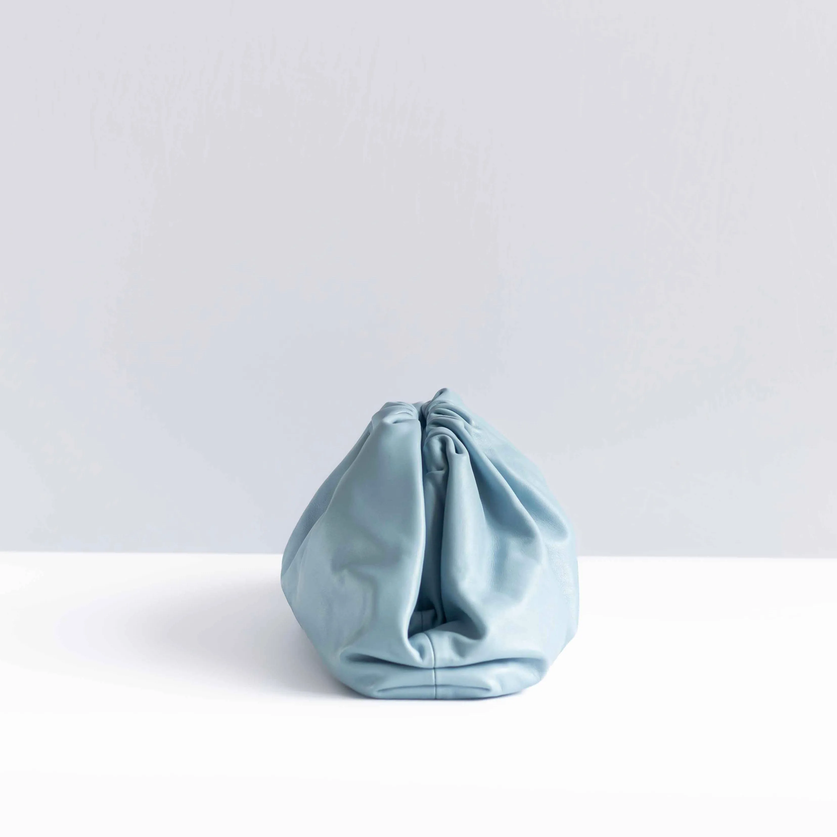 BOTTEGA VENETA - POUCH BAG LIGHT BLUE CALFSKIN