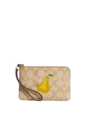 Coach Corner Zip Wristlet In Signature Canvas With Pear