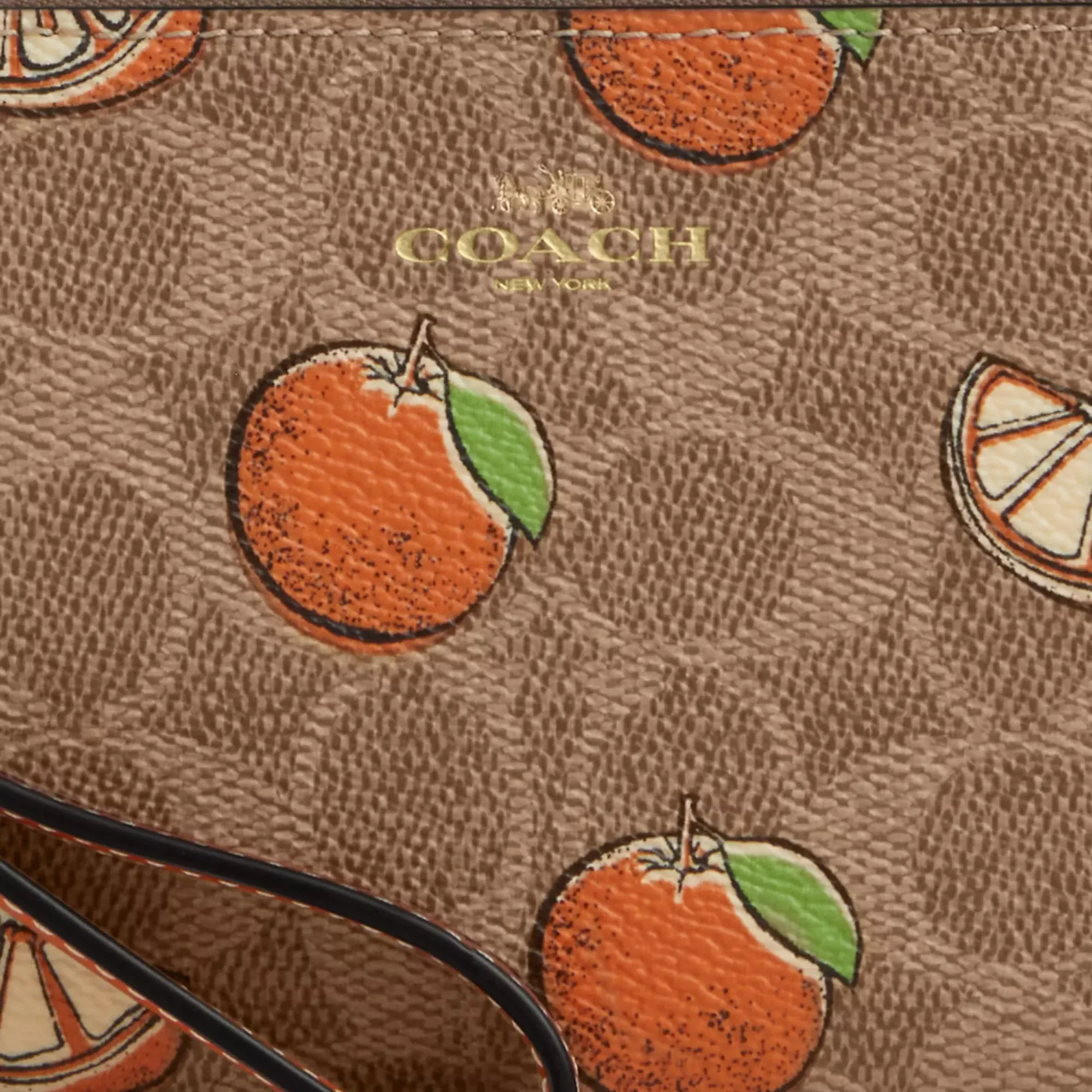 Coach Outlet Corner Zip Wristlet In Signature Canvas With Orange Print