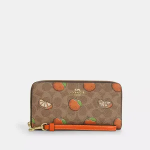 Coach Outlet Long Zip Around Wallet In Signature Canvas With Orange Print