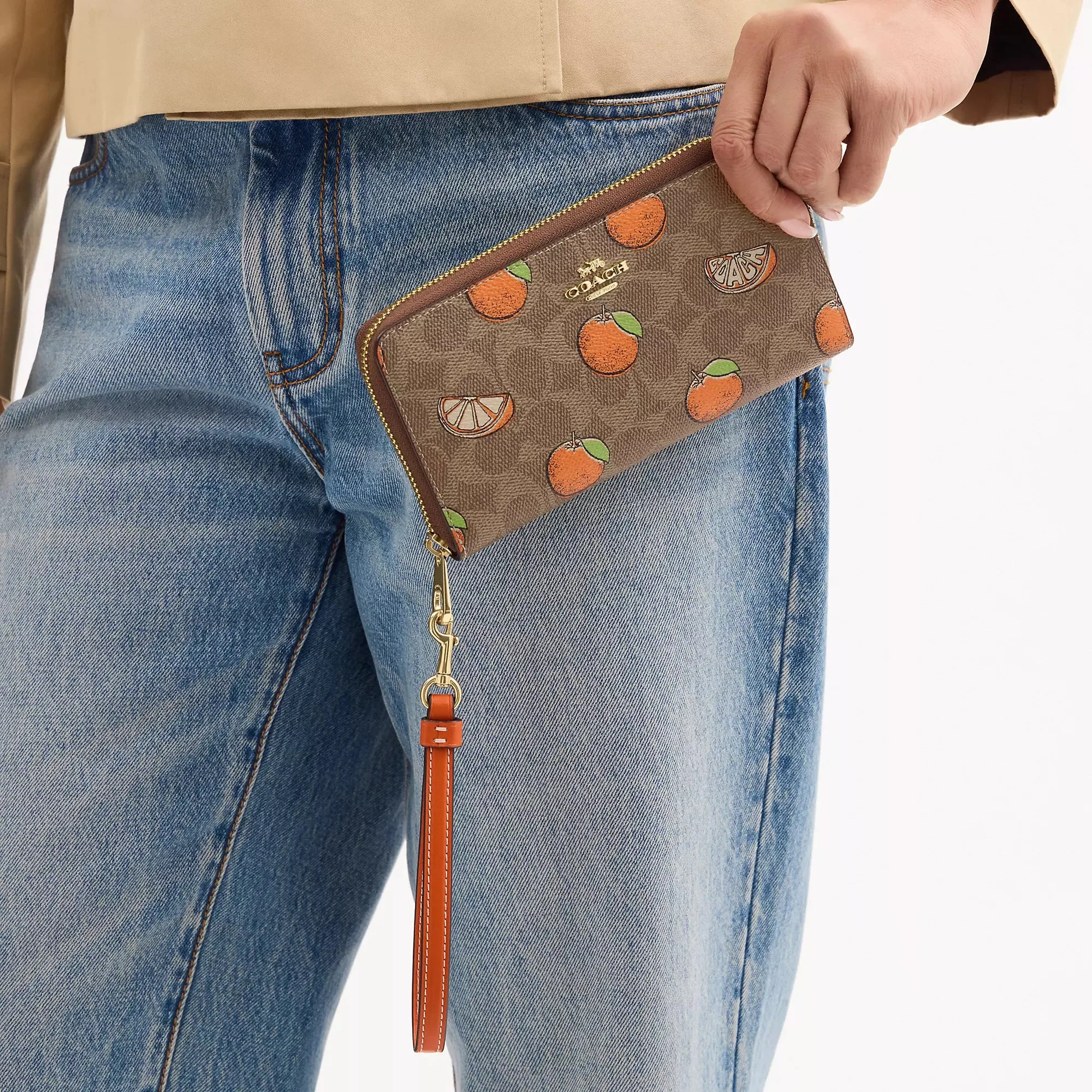 Coach Outlet Long Zip Around Wallet In Signature Canvas With Orange Print